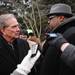 Governor Snyder's chief of staff Dennis Muchmore, left, listens to Rev. Charles Williams II, of Detroit, during a Jan. 16 rally outside of the governor's subdivision in Ann Arbor. Protesters were opposing the state's emergency manager law. Melanie Maxwell I AnnArbor.com